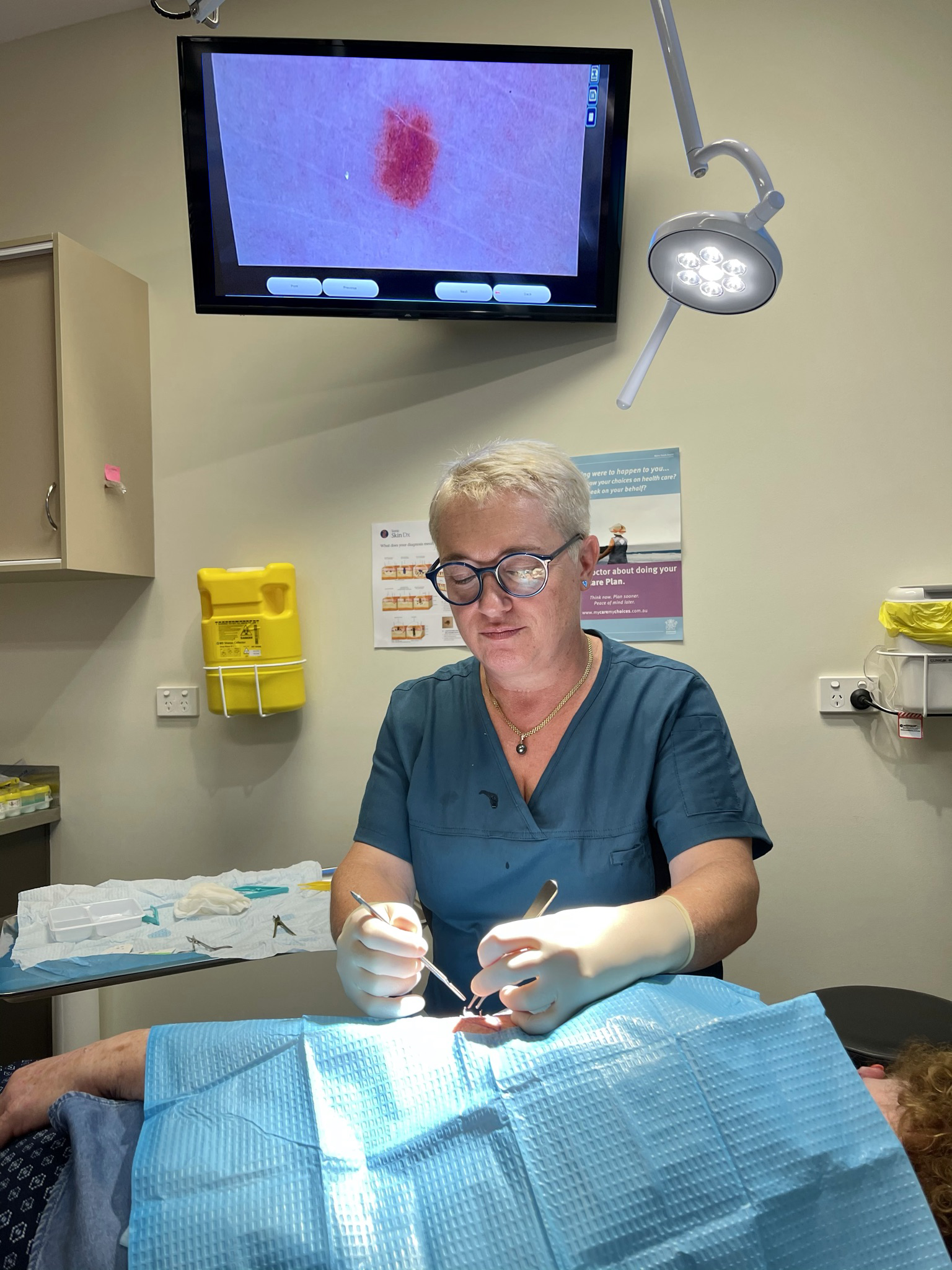 Dr Proudman performing a procedure